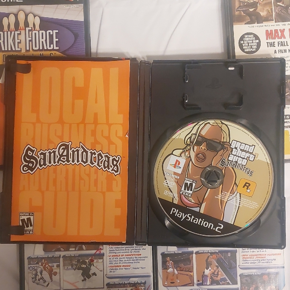 Sony PlayStation 2 Game Collection - Black, Orange, White - Picture 4 of 7